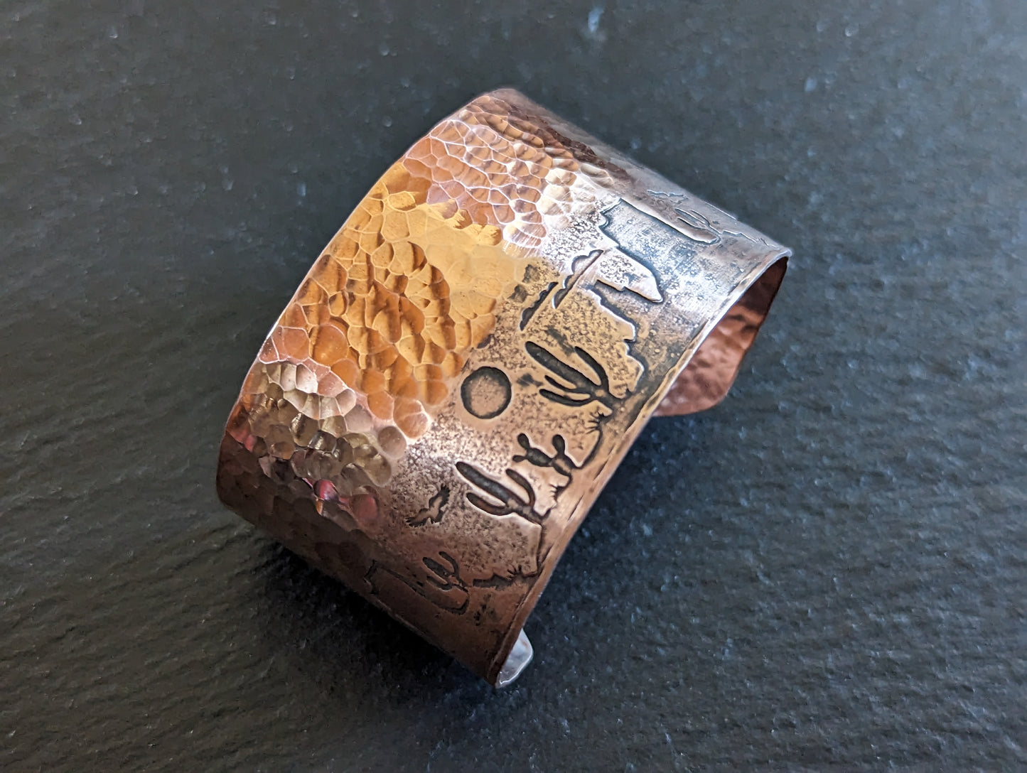 Copper cuff bracelet with hammered texture and cactus and monument mountains - Arizona desert scene