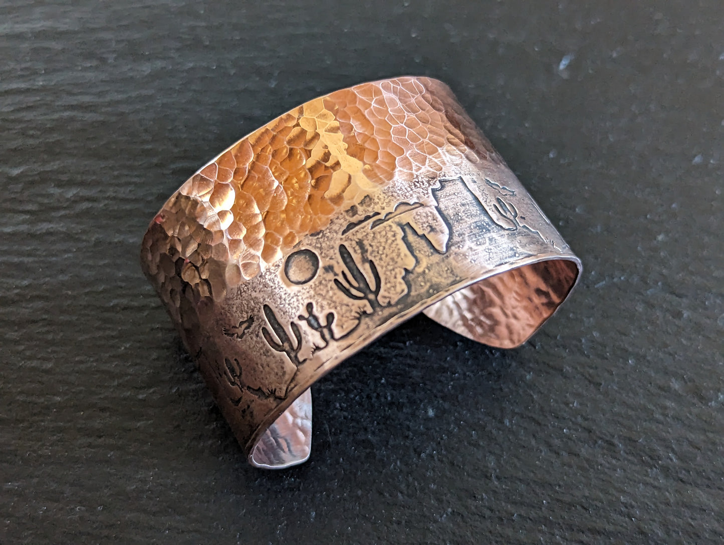 Copper cuff bracelet with hammered texture and cactus and monument mountains - Arizona desert scene