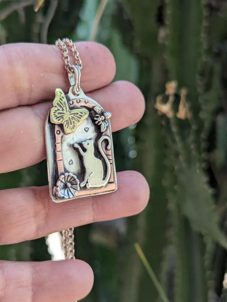 Mixed metal cat pendant