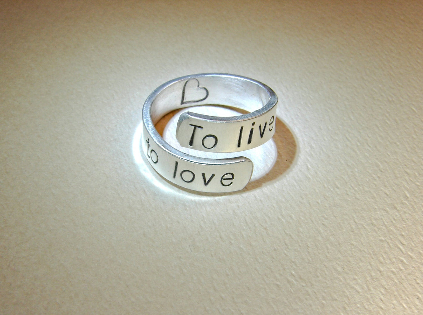 To live To love stamped bypass ring in sterling silver