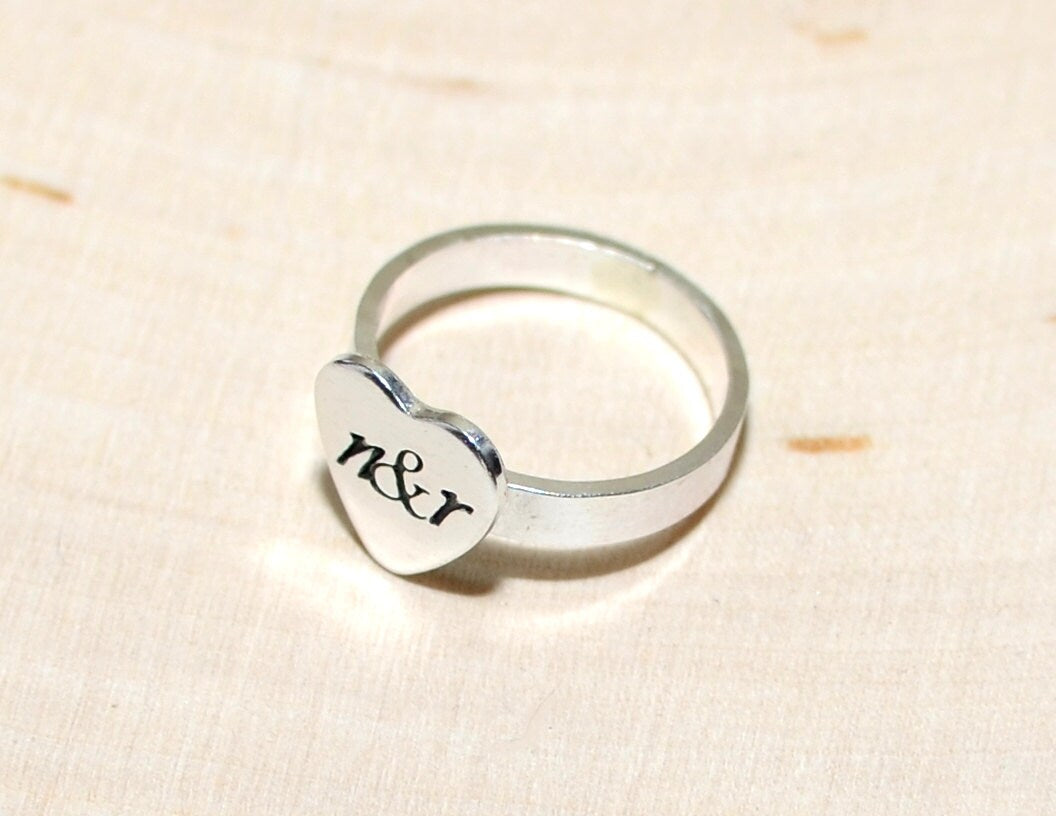 Heart ring with sterling silver band and personalized heart