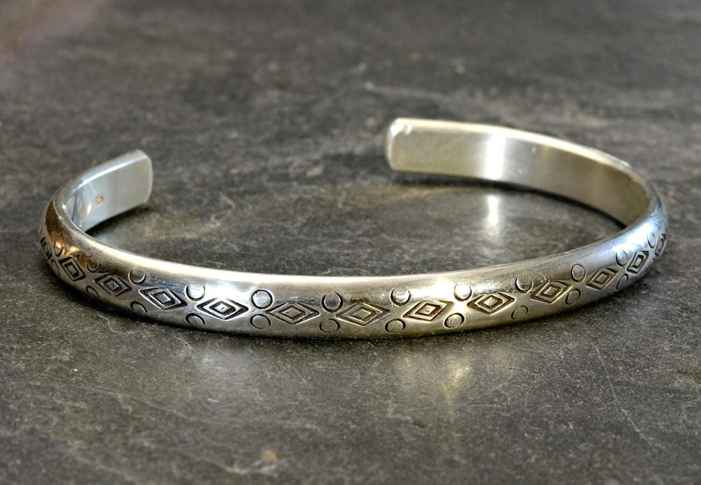 Half Round Cuff Bracelet in Sterling Silver imprinted using Handmade Native American Metal Stamps