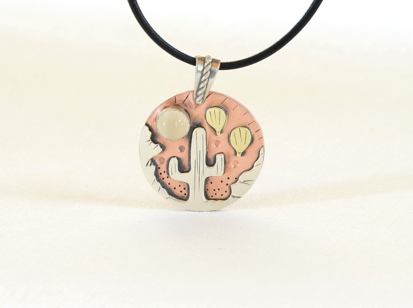 Necklace with Ballooning over the Desert theme