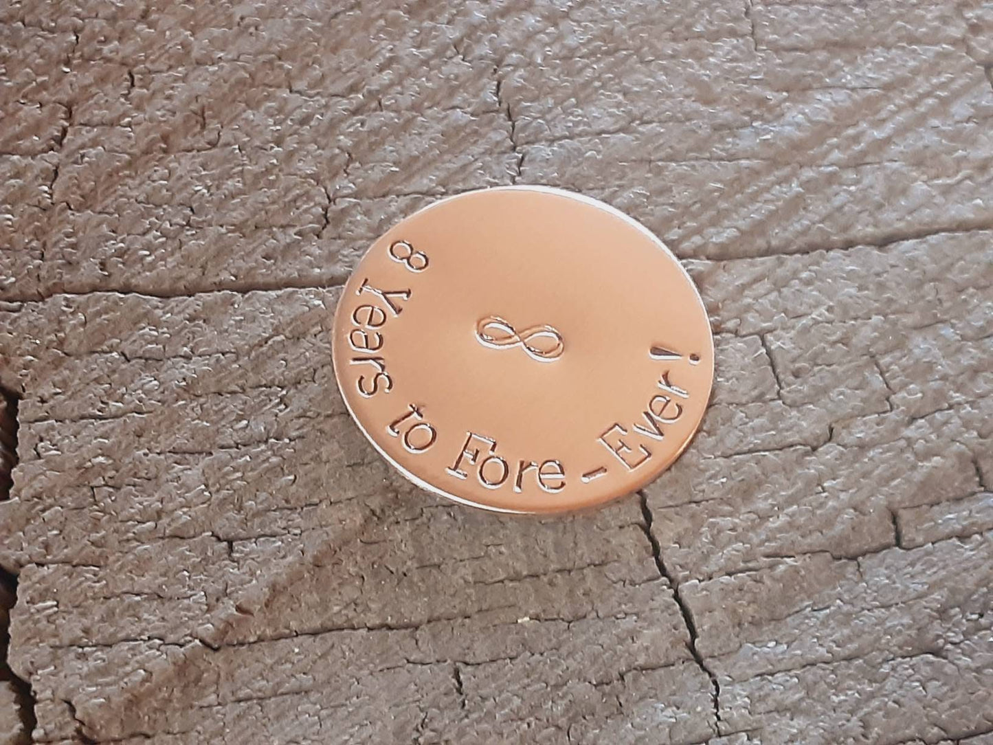 Bronze golf ball marker for 8th or 19th anniversary