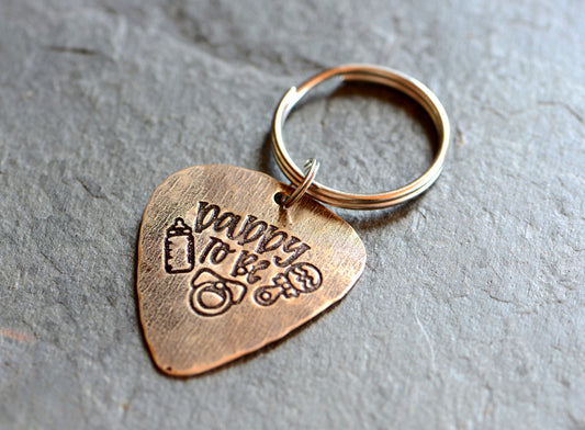 Guitar pick bronze key chain with daddy to be