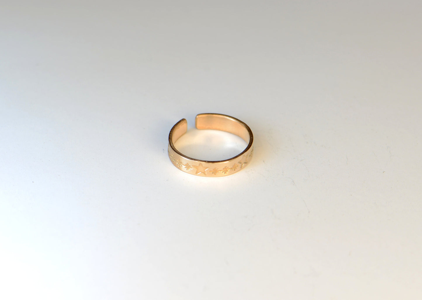 Solid 14k yellow gold toe ring stamped with stars