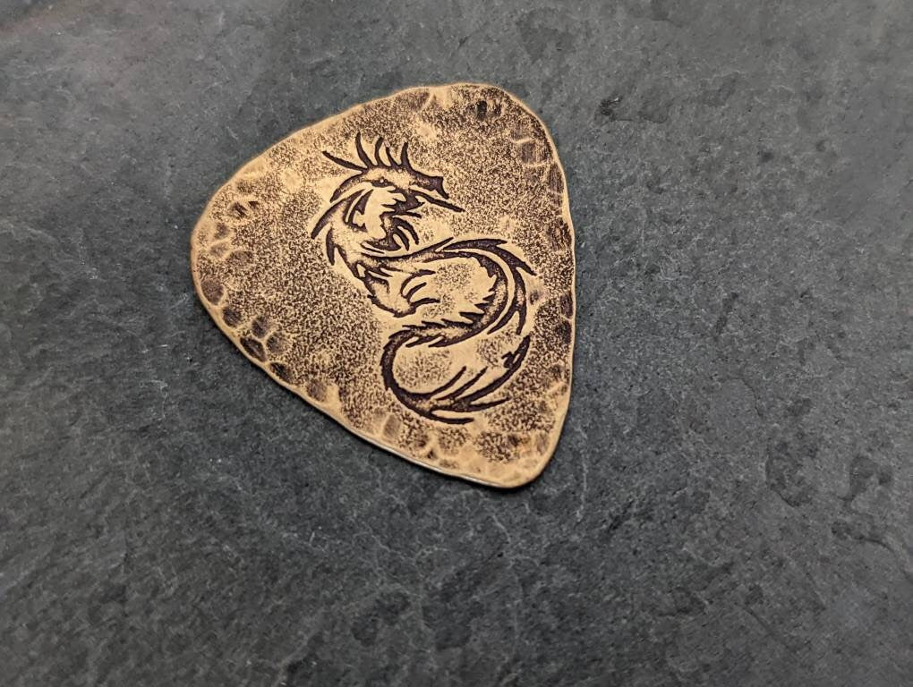 Bronze dragon guitar pick