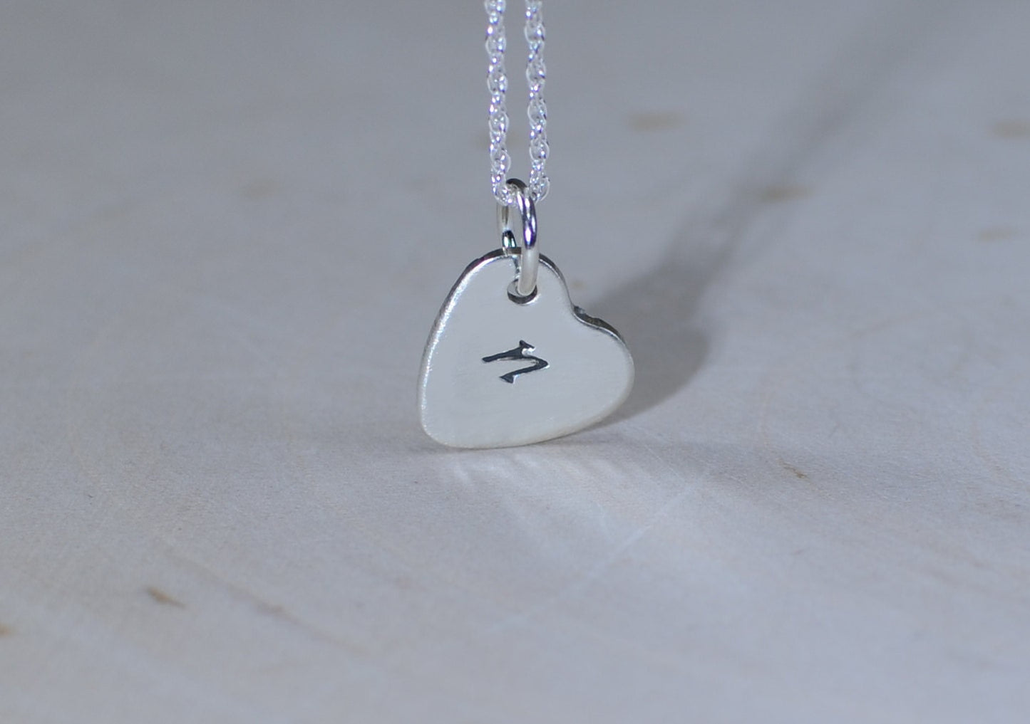 Engraved initial in sterling silver heart charm