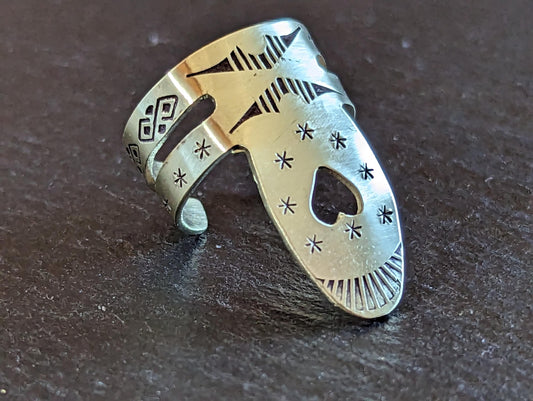 Brass finger pick with hand stamped pattern for banjo or ukulele or finger picking style playing