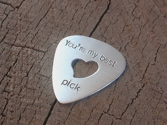 Aluminum guitar pick - playable with heart cut out to improve grip