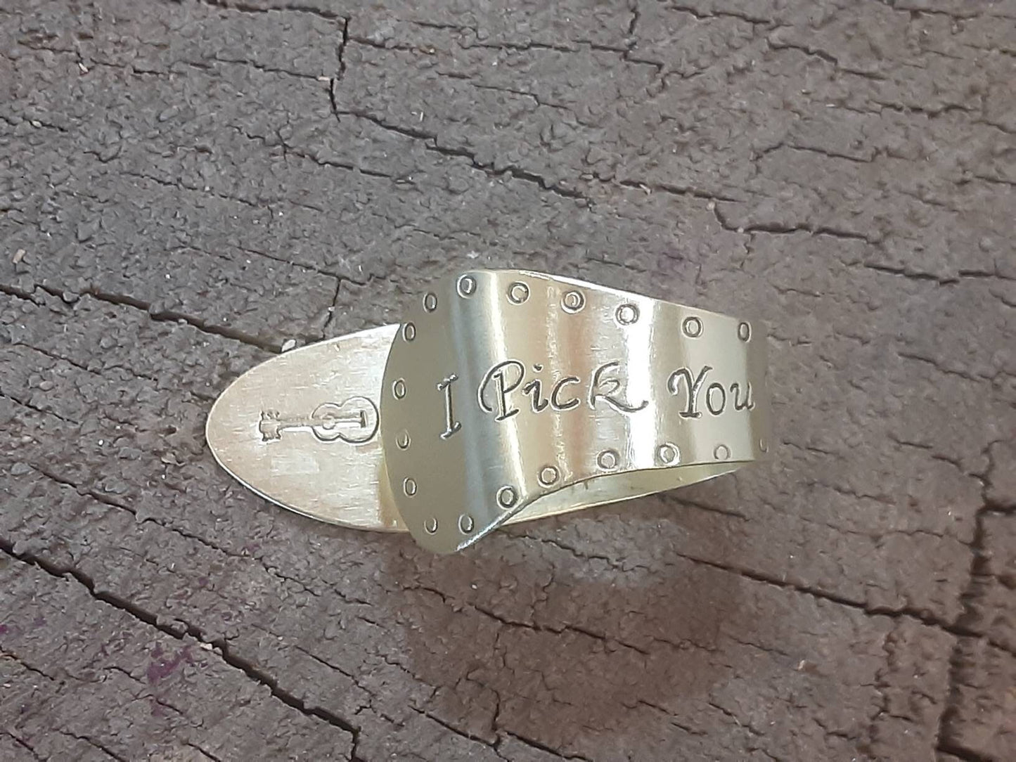 Brass thumb pick with I pick you