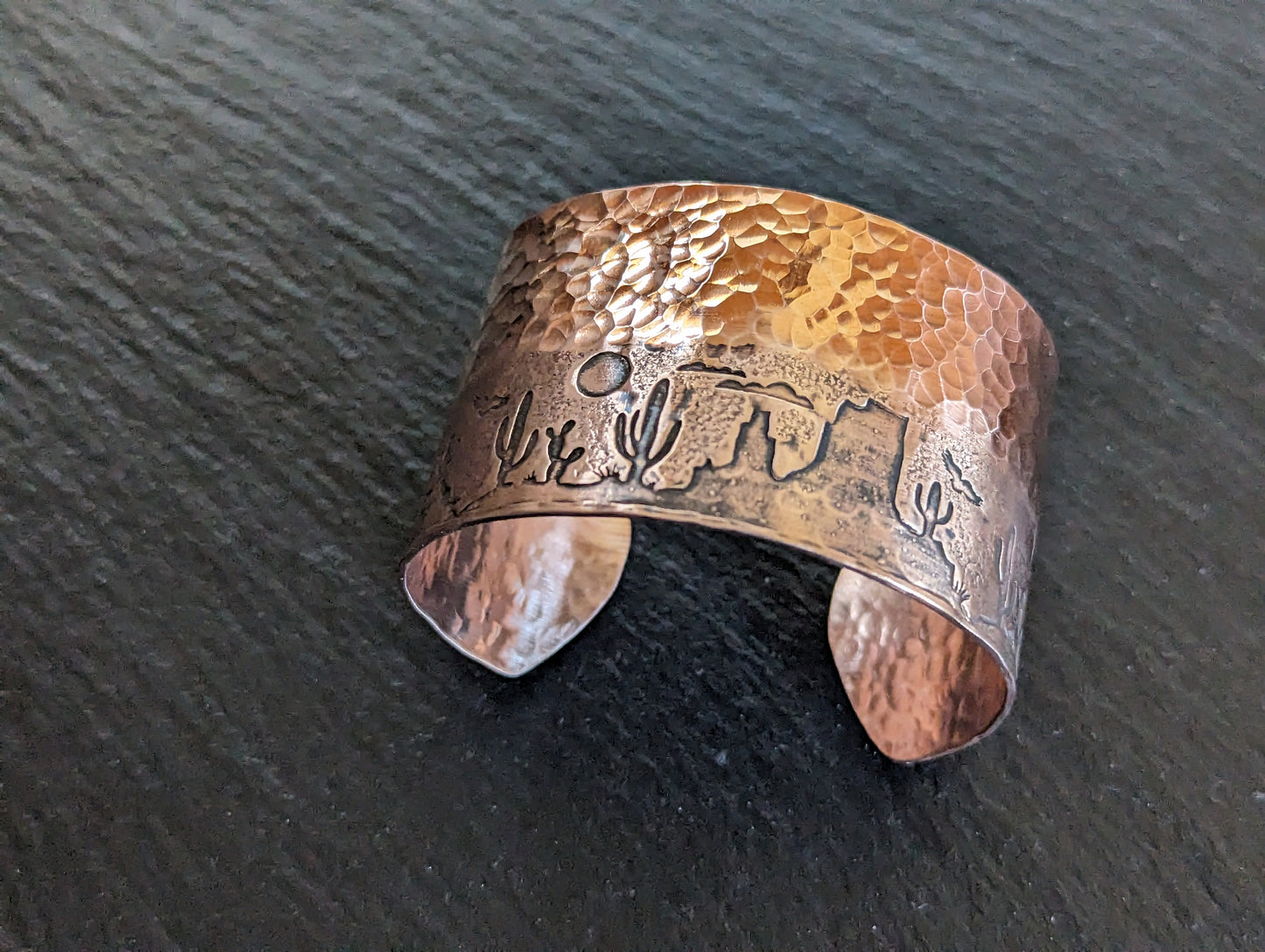 Copper cuff bracelet with hammered texture and cactus and monument mountains - Arizona desert scene