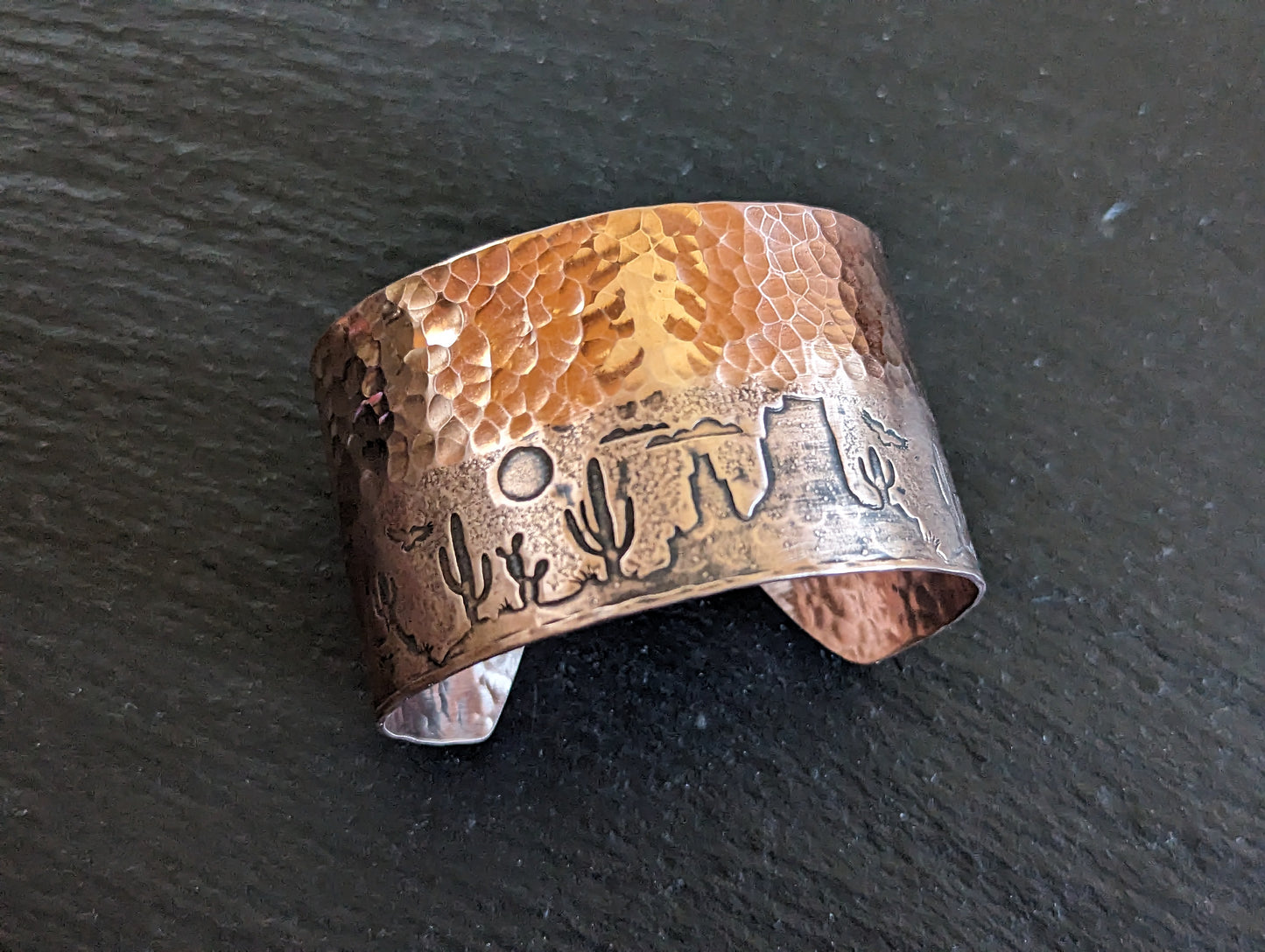Copper cuff bracelet with hammered texture and cactus and monument mountains - Arizona desert scene