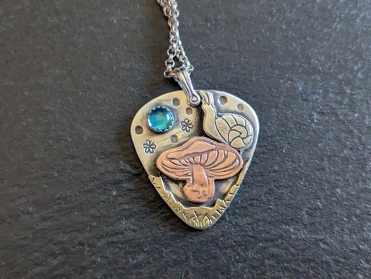 Magic mushroom necklace with snail and Topaz