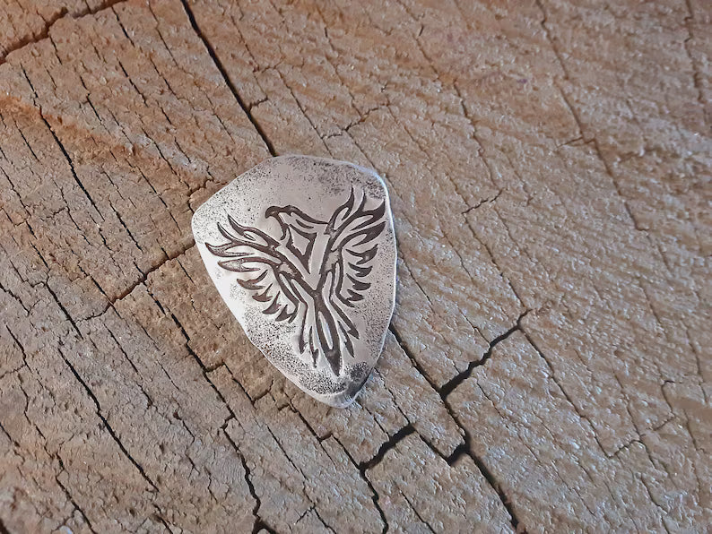 Sterling guitar pick with Phoenix - playable