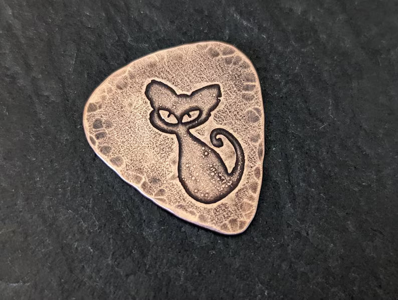 Copper guitar pick with cat and hammered edge - playable