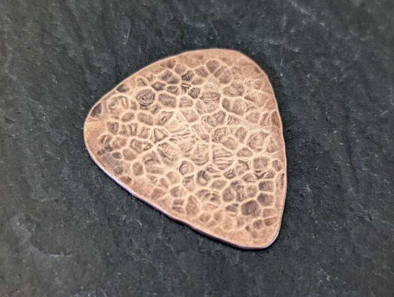 Copper guitar pick with cat and hammered edge - playable