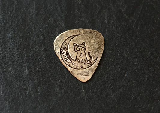 Bronze guitar pick with cat and moon - handmade and playable