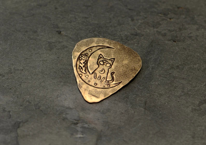 Bronze guitar pick with cat and moon - handmade and playable
