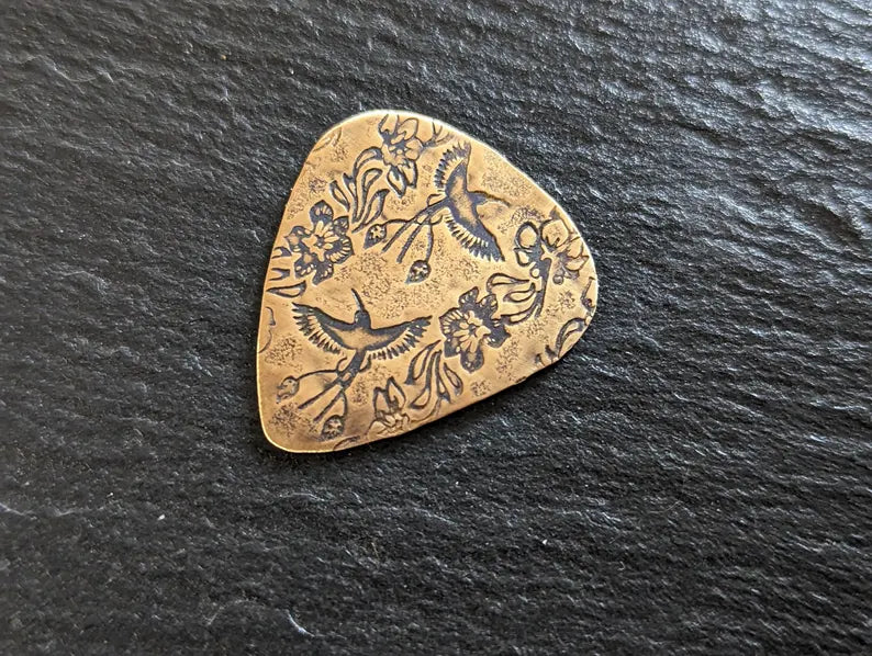 Bronze guitar pick - playable with birds of paradise pattern