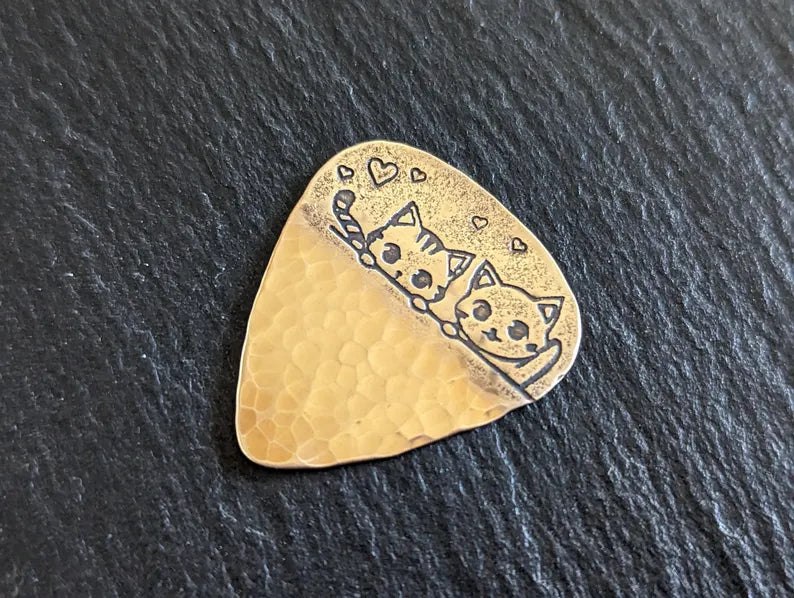 Bronze cat guitar pick - handmade and playable