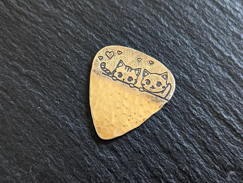 Bronze cat guitar pick - handmade and playable