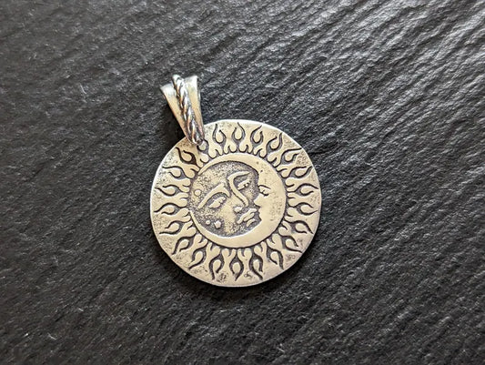 Sterling silver sun and moon charm