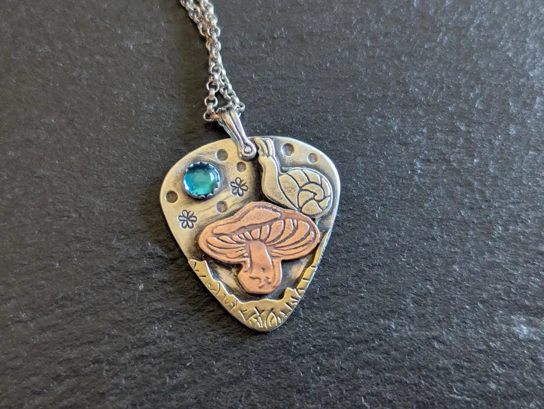 Magic mushroom necklace with snail and Topaz
