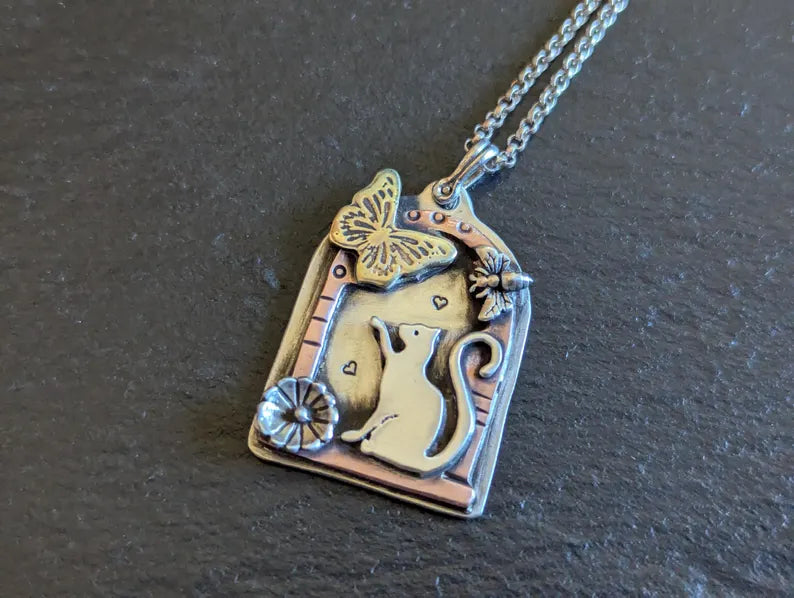 Mixed metal cat pendant