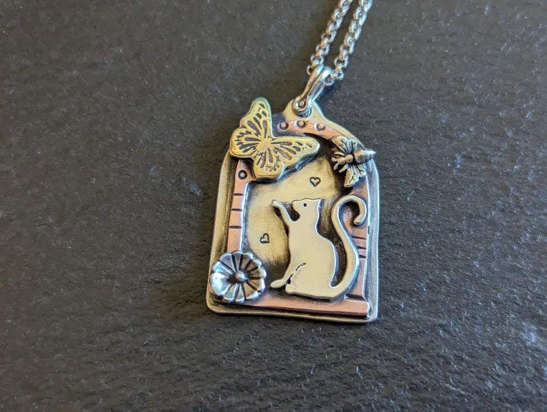 Mixed metal cat pendant