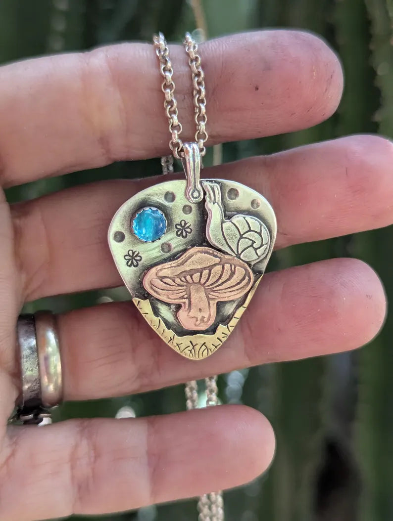 Magic mushroom necklace with snail and Topaz