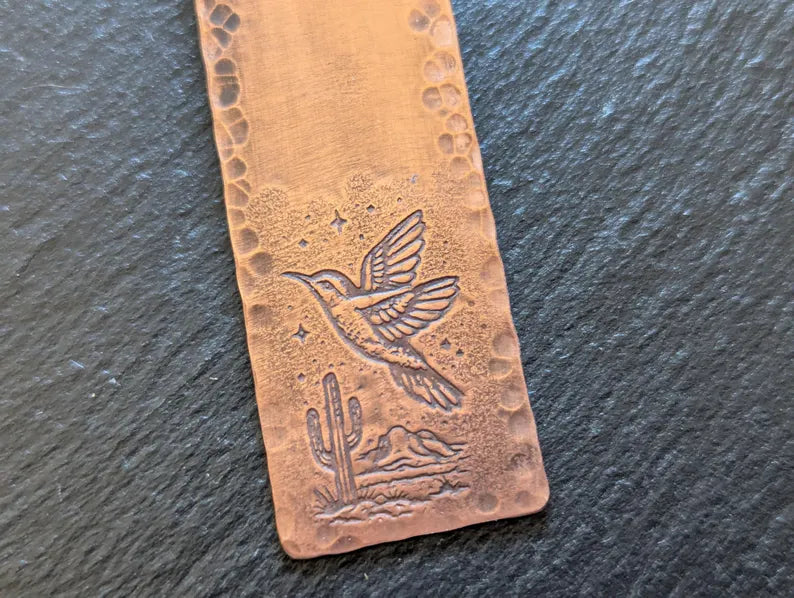 Copper bookmark with hummingbird and desert landscape