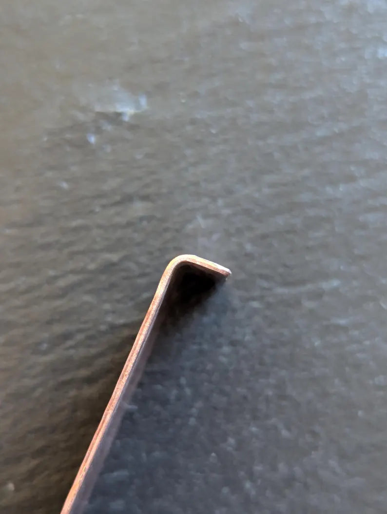 Copper bookmark with hummingbird and desert landscape