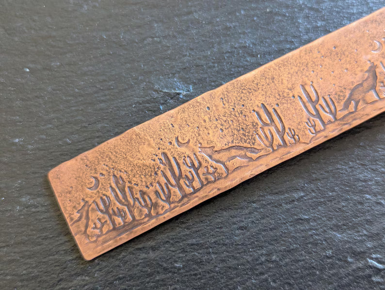 Copper bookmark with howling coyote and cactus
