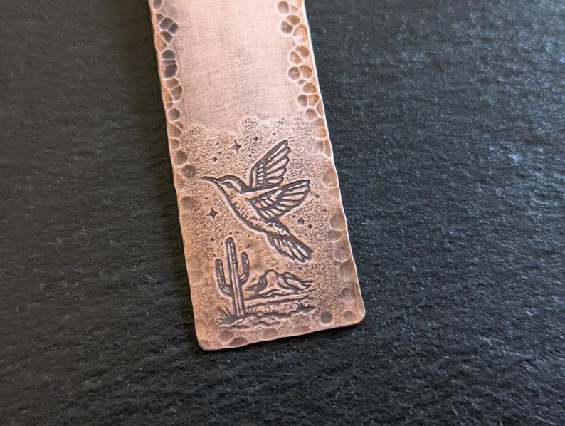 Copper bookmark with hummingbird and desert landscape
