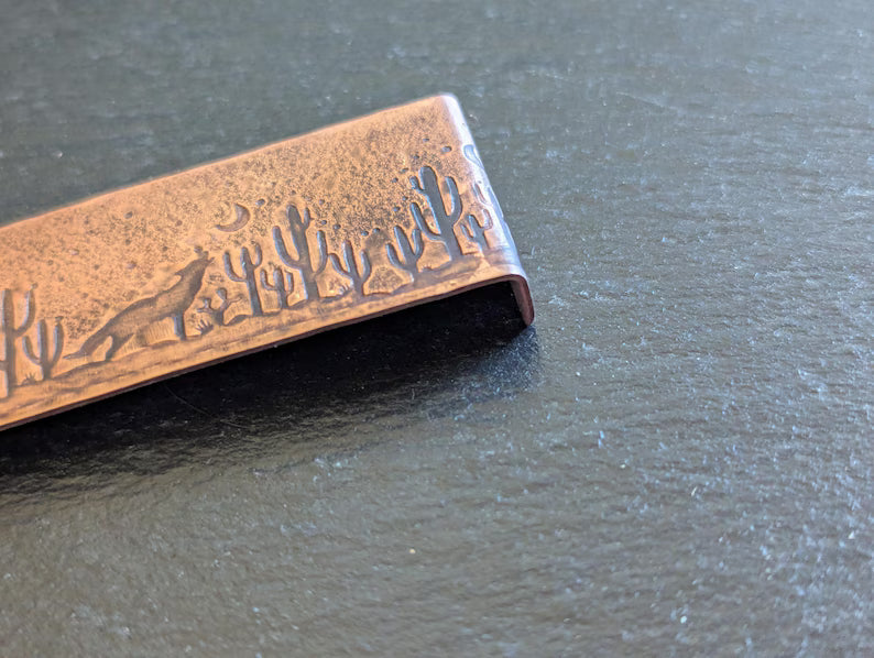 Copper bookmark with howling coyote and cactus