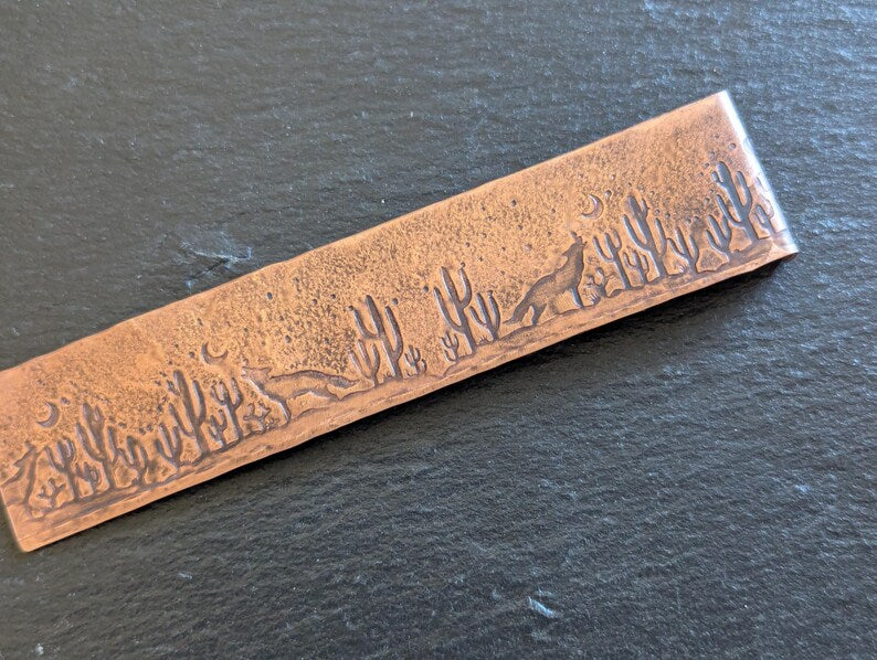 Copper bookmark with howling coyote and cactus