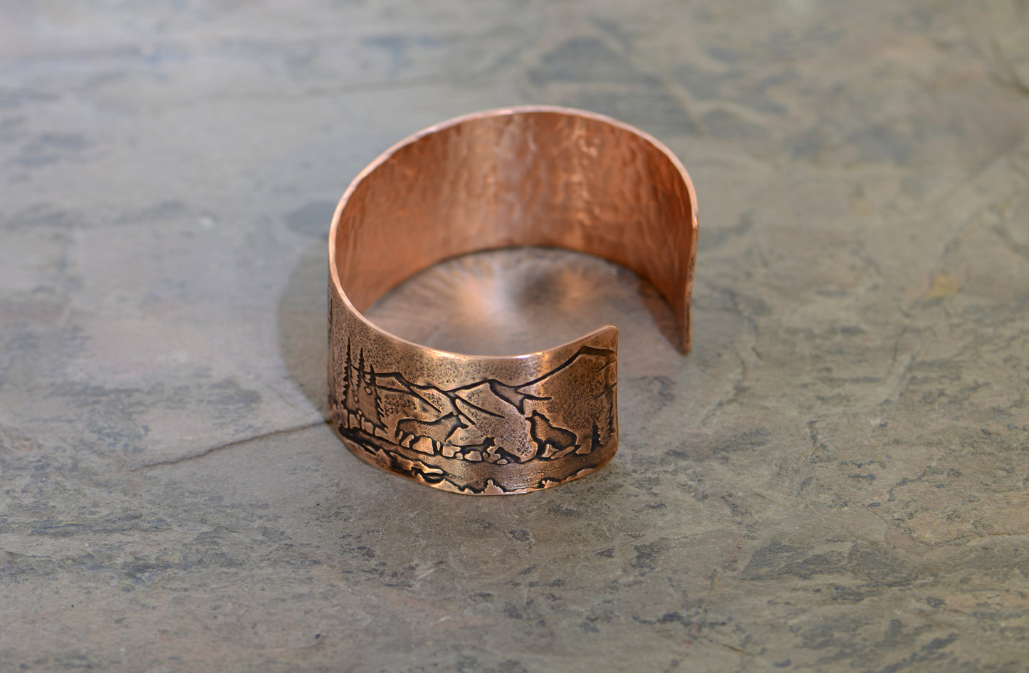 Copper bracelet with wolves