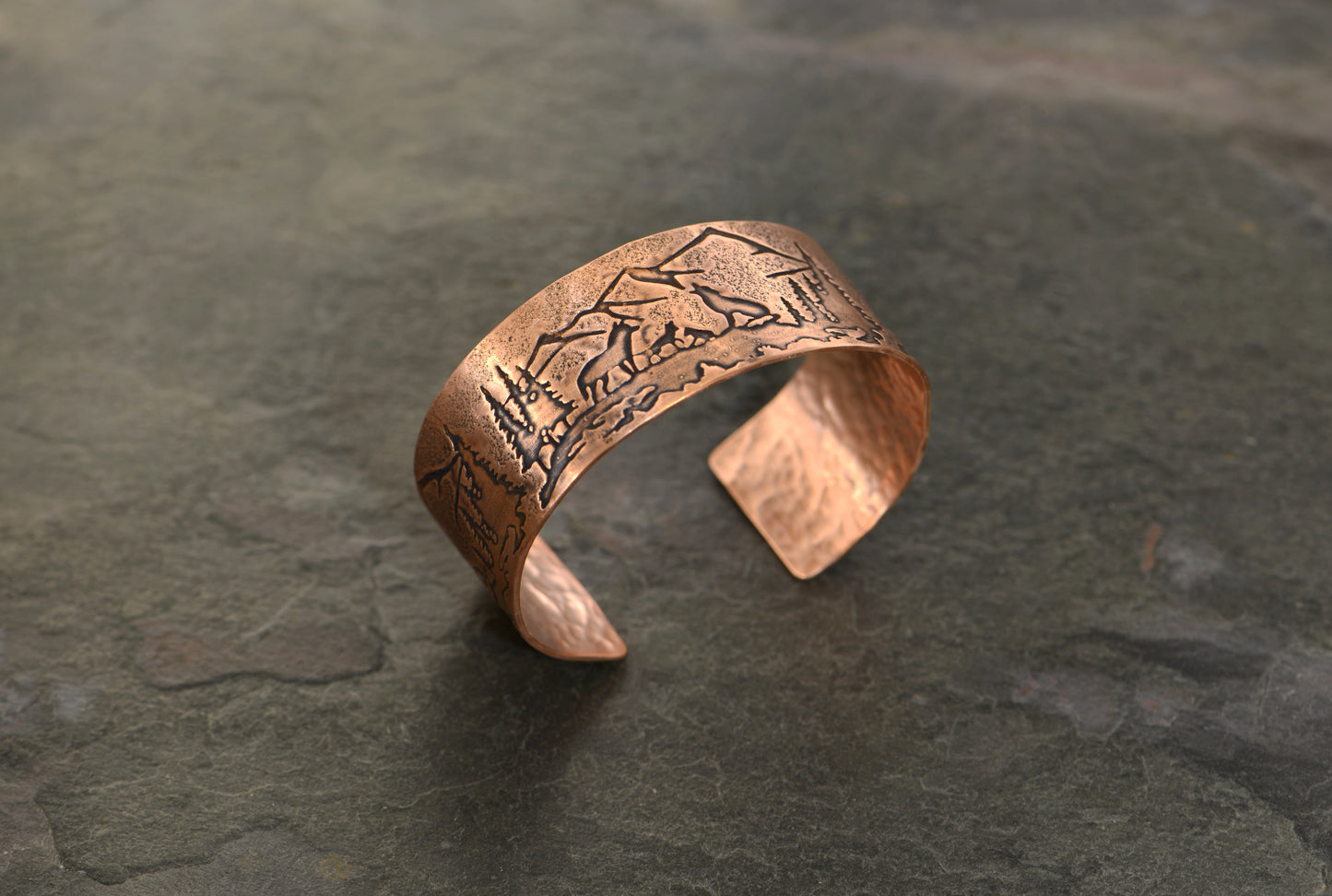 Copper bracelet with wolves