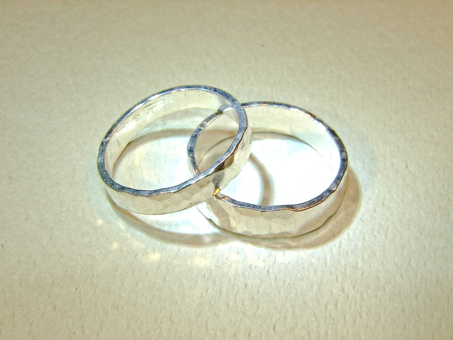 Hammered sterling silver ring set or weddings bands with the ability to customize