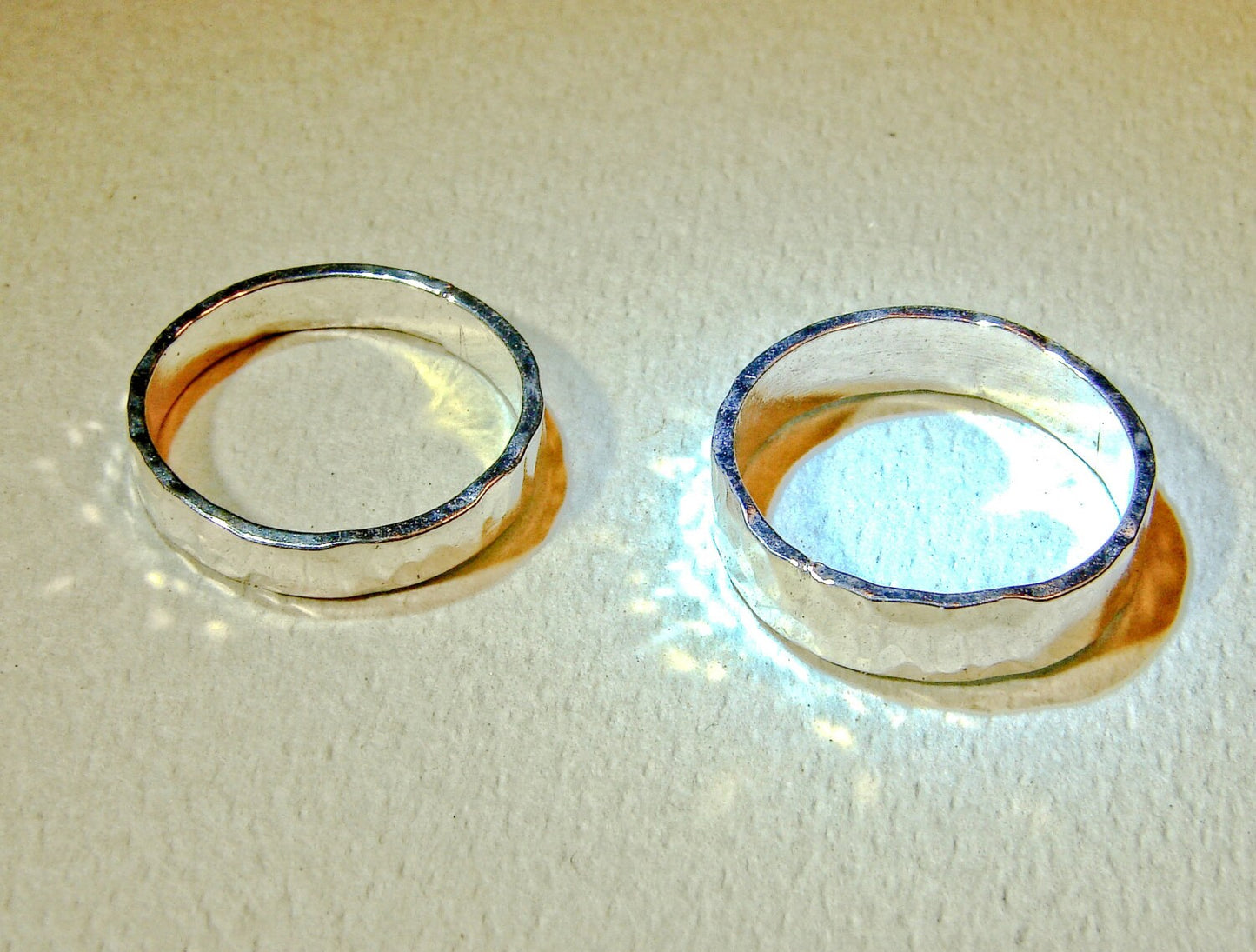 Hammered sterling silver ring set or weddings bands with the ability to customize