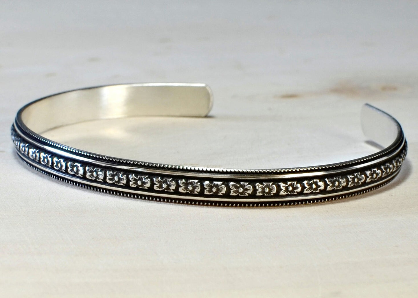 Sterling Silver Hibiscus Flower Patterned Bracelet with dark Patina