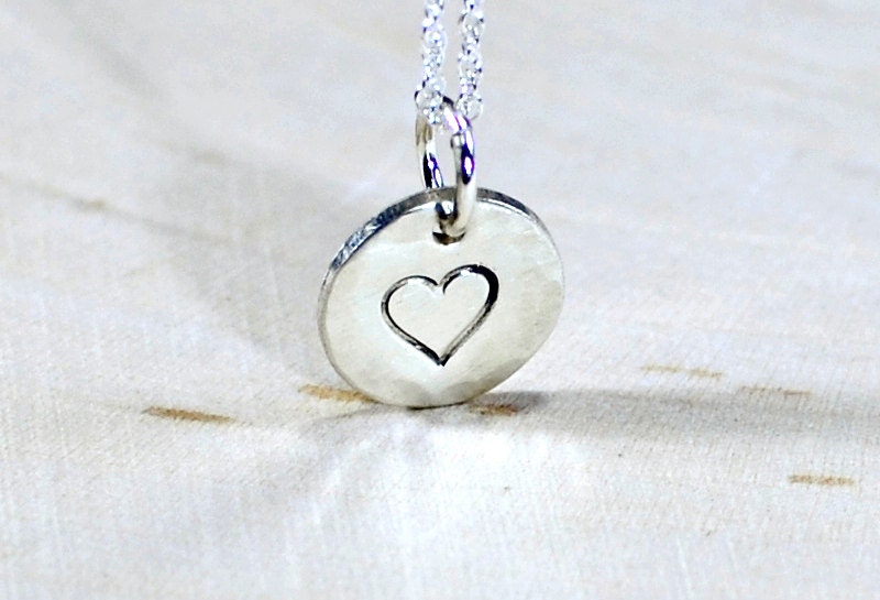 Sterling Silver Disc with a Heart Theme