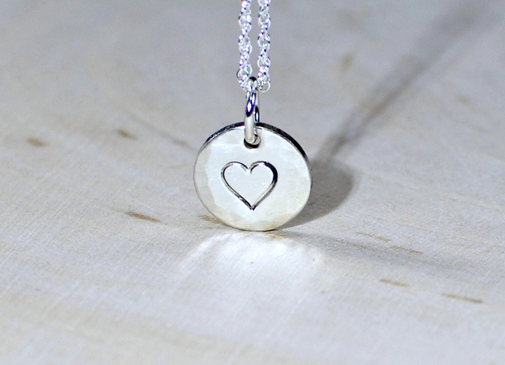 Sterling Silver Disc with a Heart Theme