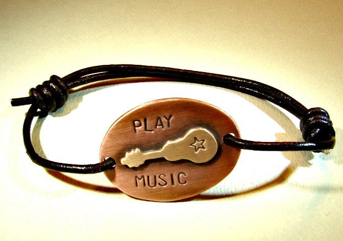 Guitar wrap bracelet with black leather cord