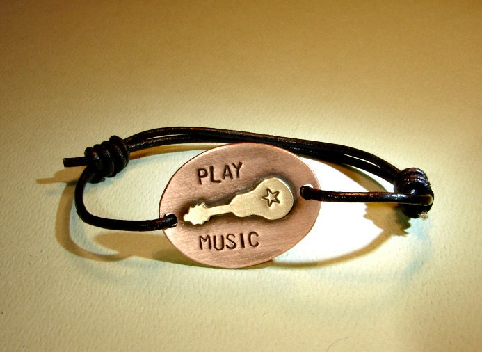 Guitar wrap bracelet with black leather cord