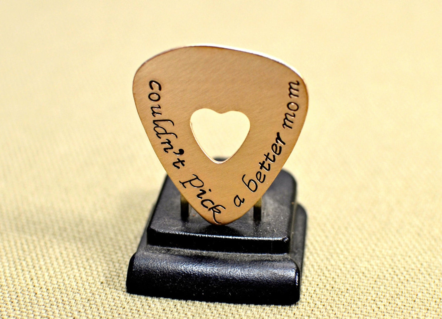 Couldn't pick a better mom guitar pick in bronze