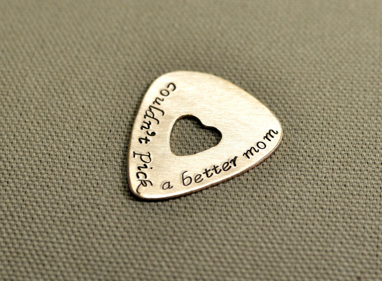 Couldn't pick a better mom guitar pick in bronze