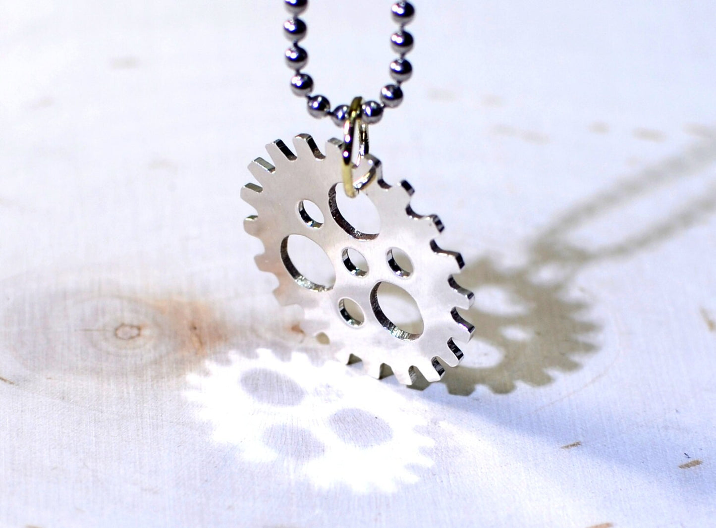 Sterling silver bicycle sprocket necklace