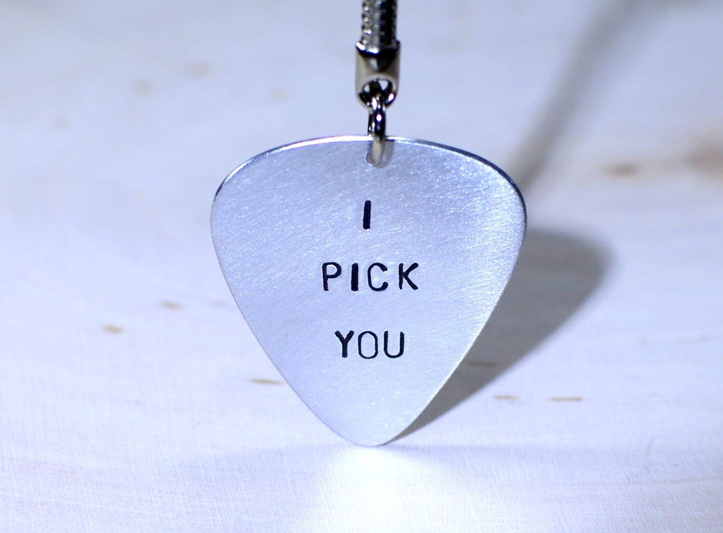 Sterling silver guitar pick key chain with I pick you